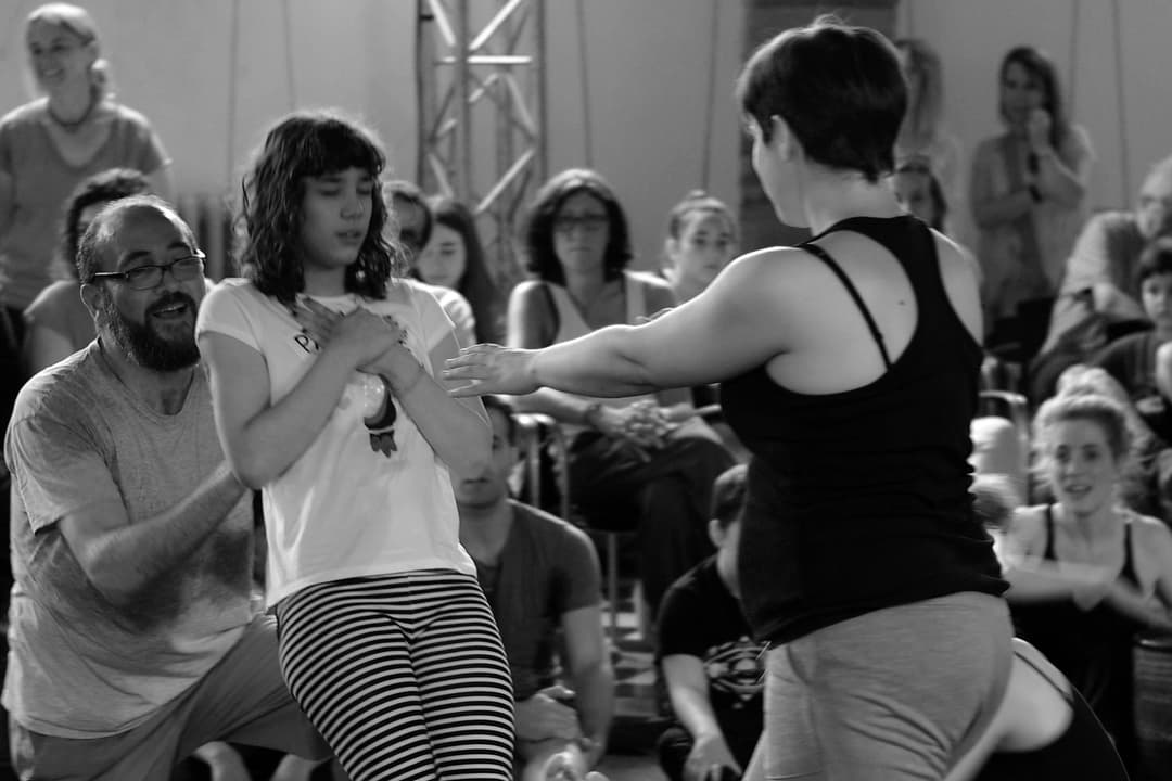 Anna takes part in an interactive sensory theatre session in Granollers, Catalunya, 2019, surrounded by other participants.